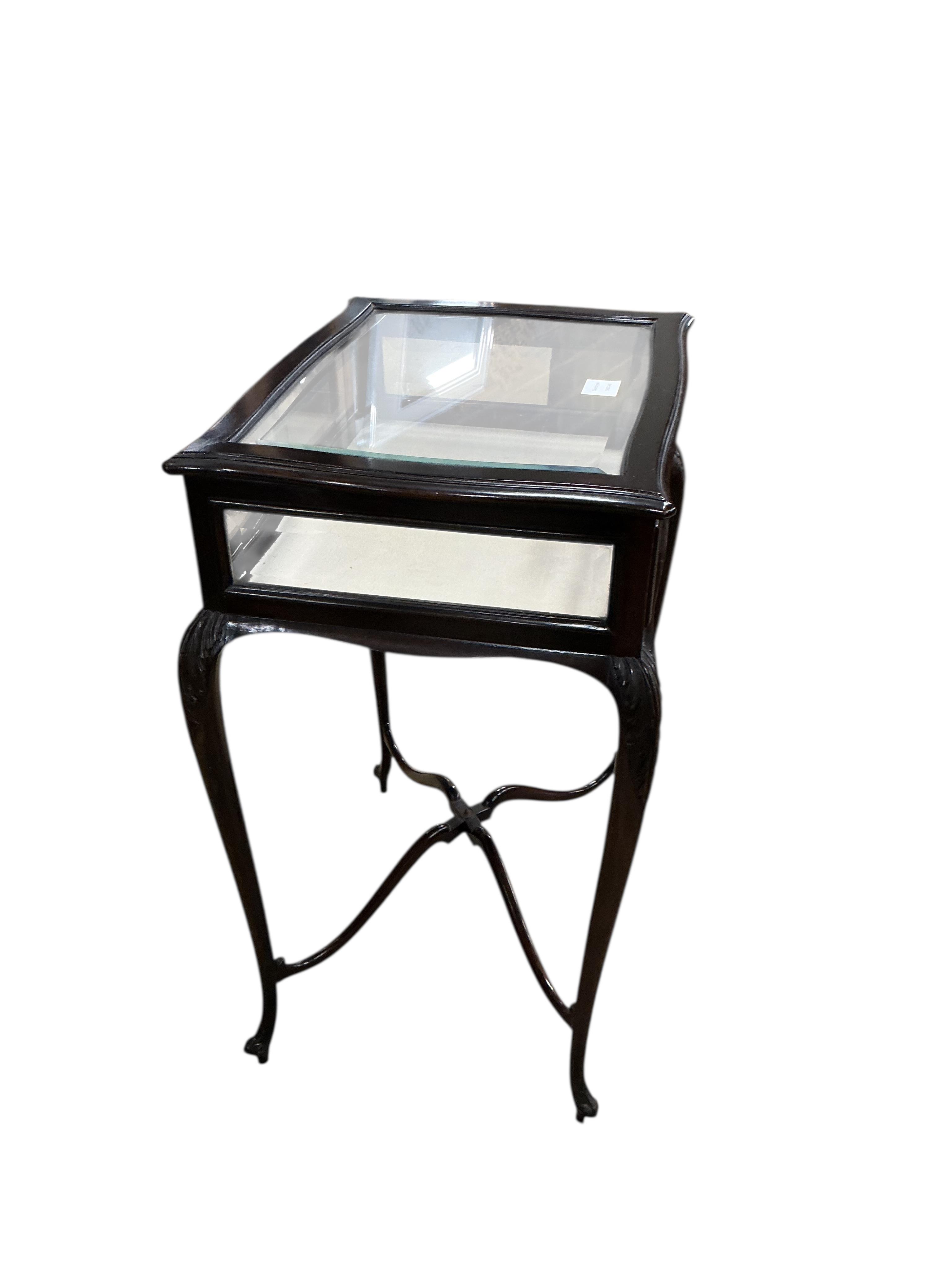 A late Victorian serpentine mahogany bijouterie table, width 52cm, depth 42cm, height 76cm